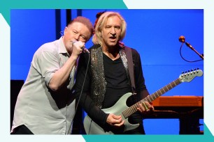 Eagles icons Don Henley (L) and Joe Walsh perform together onstage.