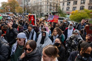 Students participate in a protest in support of Palestine and for free speech outside of the Columbia University campus on November 15, 2023
