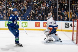 Quinn Hughes scored the game-winning goal on Ilya Sorokin in overtime of the Islanders' 4-3 loss to the Canucks.