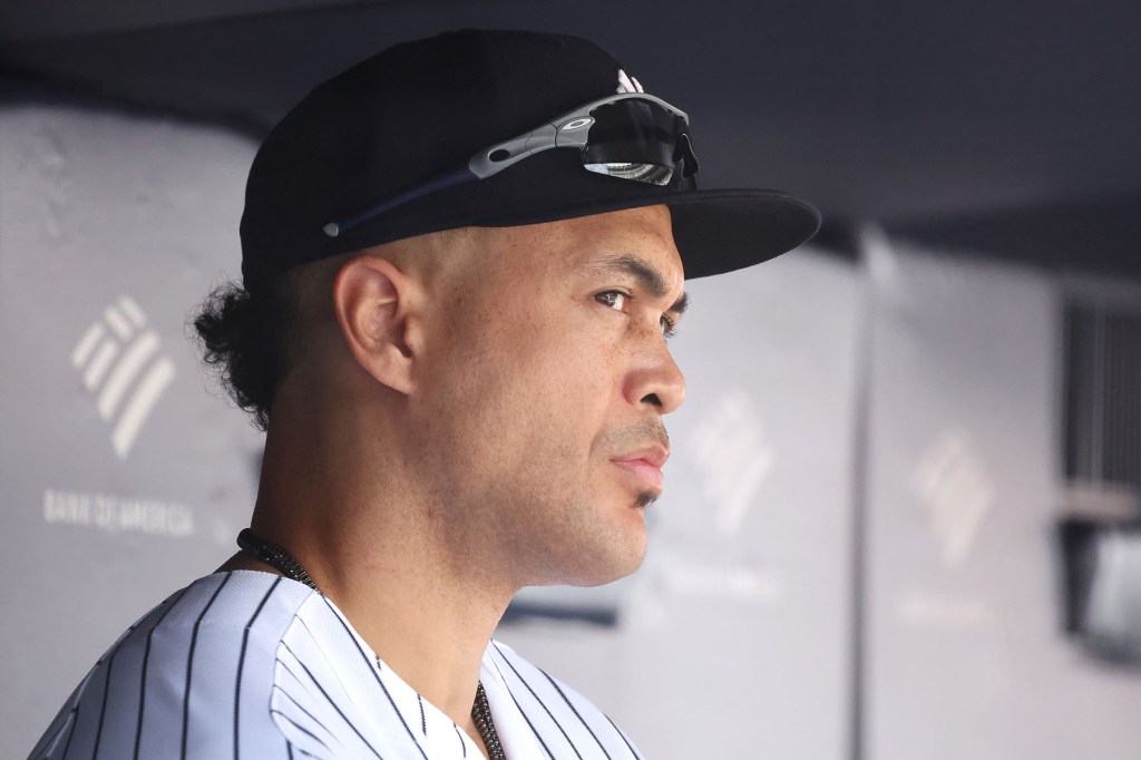 New York Yankees designated hitter Giancarlo Stanton (27) in the dugout during the third inning when the New York Yankees played the Boston Red Sox Saturday, August 19, 2023 at Yankee Stadium in the Bronx, NY.